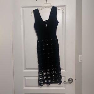 The sexiest mini dress you will ever own. BEBE NWT studded cage dress